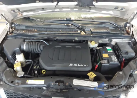 2012 Dodge Grand Caravan Crew z USA, uszkodzony, nr VIN 2C4RDGDG8CR399438